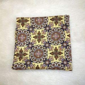 FABRIC Vintage Brown on gold regularly set stylized medallions 1 yd +